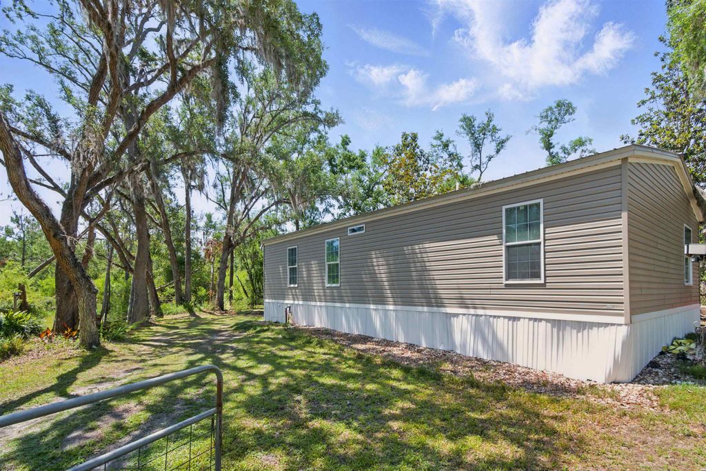 Photo of 2411 Lonnie Houck Road, Perry, FL 32348 (MLS # 388448)