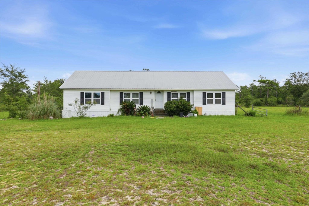 Photo of 22457 NW Valencia Drive, Altha, FL 32421 (MLS # 402277)