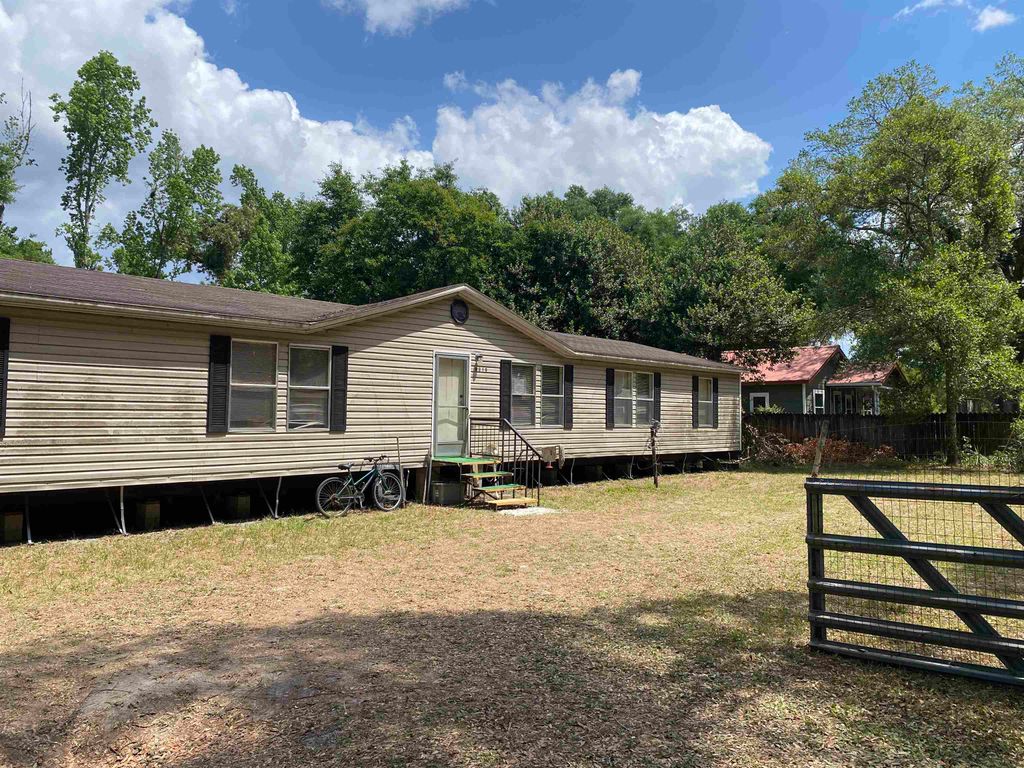 Photo of 9310 Elgin Road, Woodville, FL 32362 (MLS # 399089)