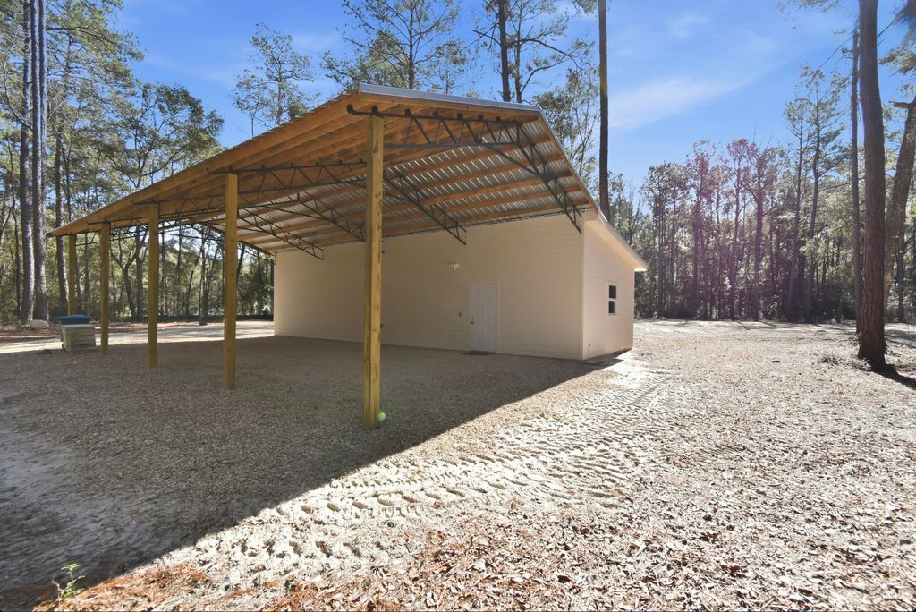 Photo of 180 Wildflower Lane, Crawfordville, FL 32327 (MLS # 394950)