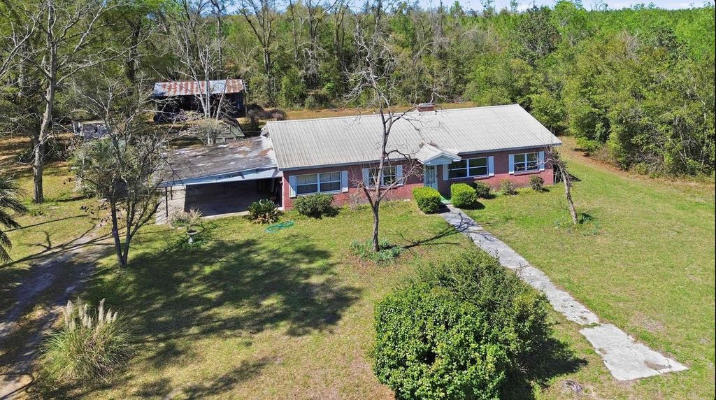 Photo of 1292 SE Cr 255, Lee, FL 32059 (MLS # 397288)