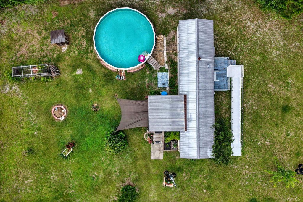 Photo of 1521 T W WILSON RD RD, Perry, FL 32347 (MLS # 401642)