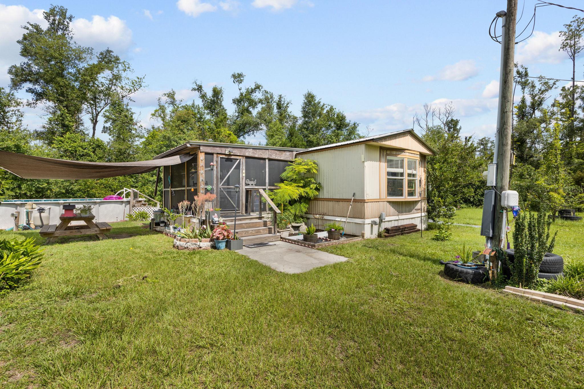 Photo 1 of 48 — 1521 T W WILSON RD, Perry, FL 32347