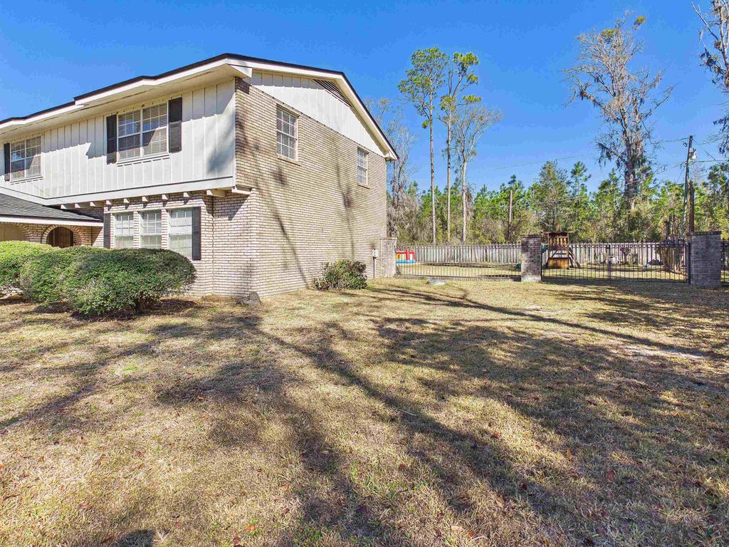Photo of 206 Pineland Street, Perry, FL 32348 (MLS # 396881)