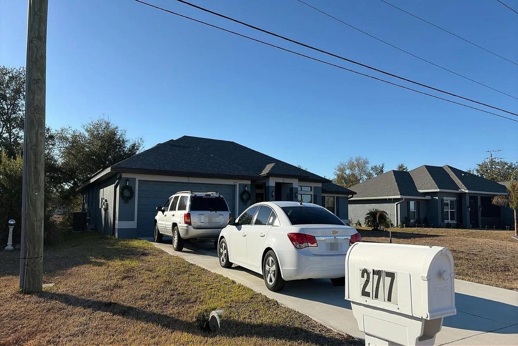 Photo of 277 Seasons Drive, Other Florida, FL 33983 (MLS # 400891)
