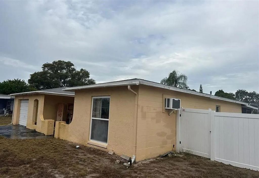 Photo of 8053 Colrain Drive, Other Florida, FL 34668 (MLS # 395014)