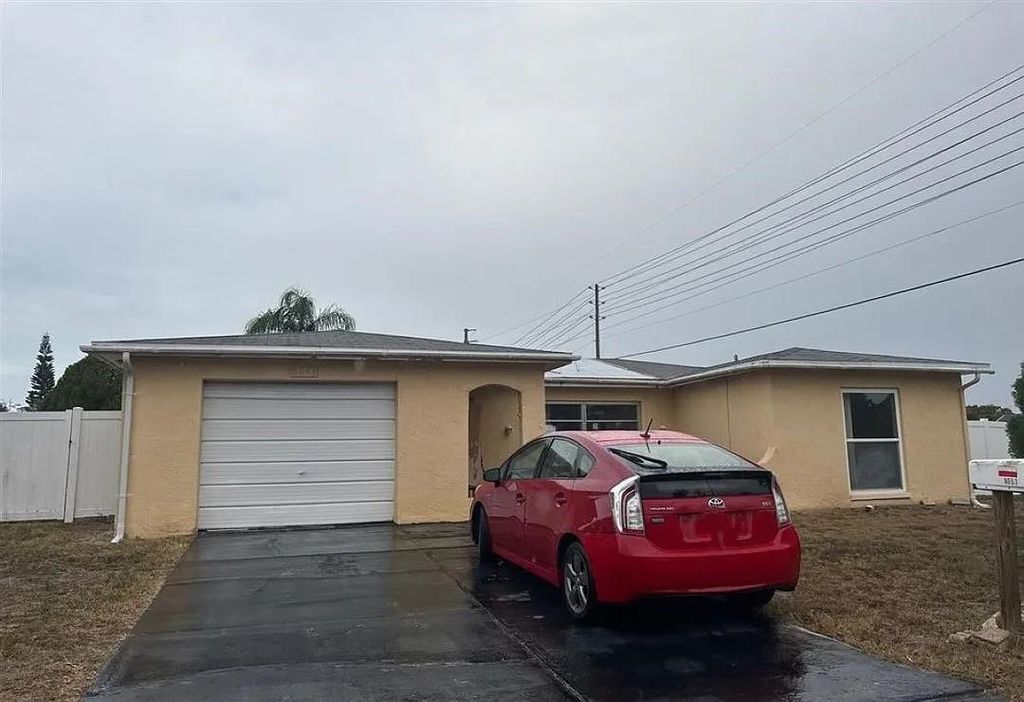 Photo of 8053 Colrain Drive, Other Florida, FL 34668 (MLS # 395014)