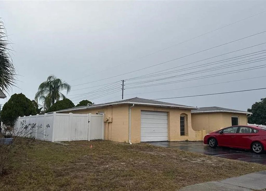 Photo of 8053 Colrain Drive, Other Florida, FL 34668 (MLS # 395014)