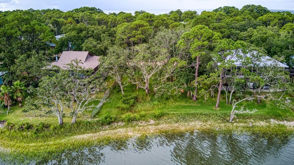 Photo of 175 Harbor Circle, Alligator Point, FL 32346 (MLS # 388335)