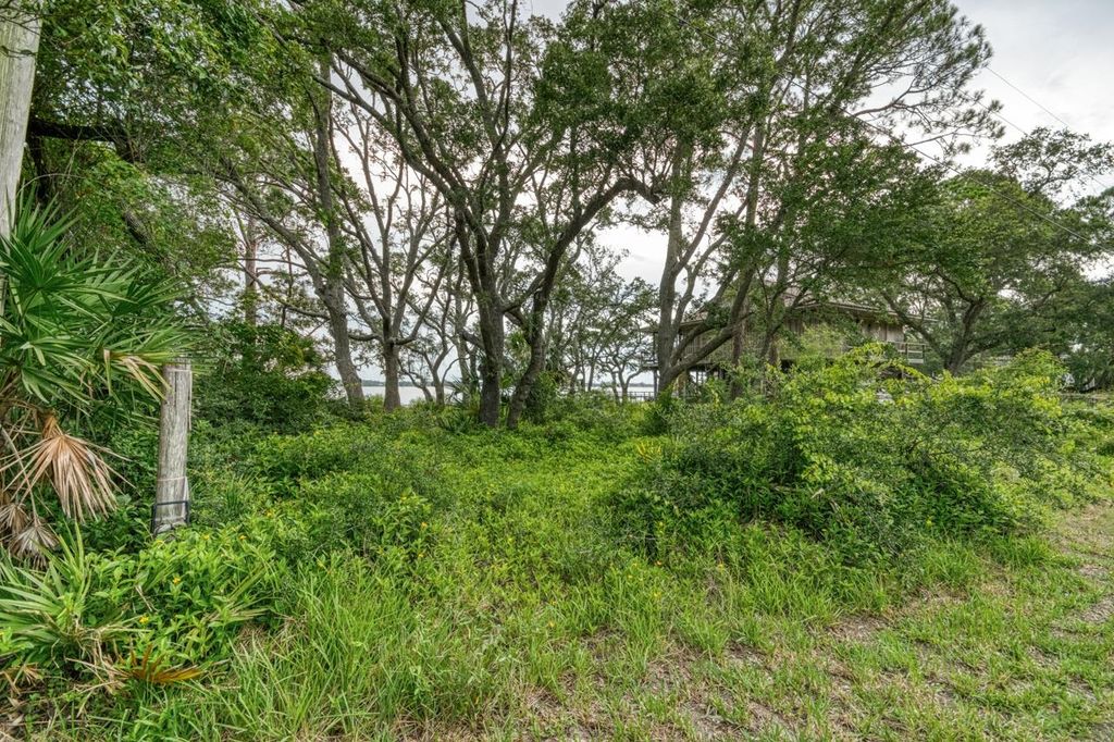 Photo of 175 Harbor Circle, Alligator Point, FL 32346 (MLS # 388335)