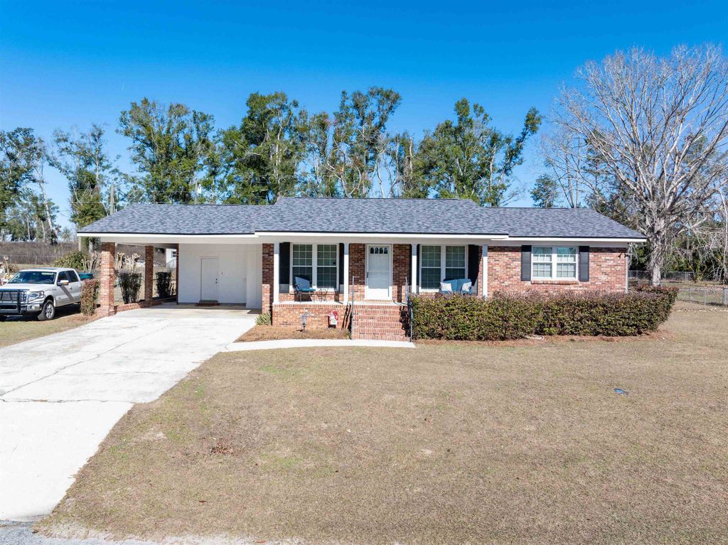 Photo of 454 NW Whispering Pines Loop, Madison, FL 32340 (MLS # 394491)