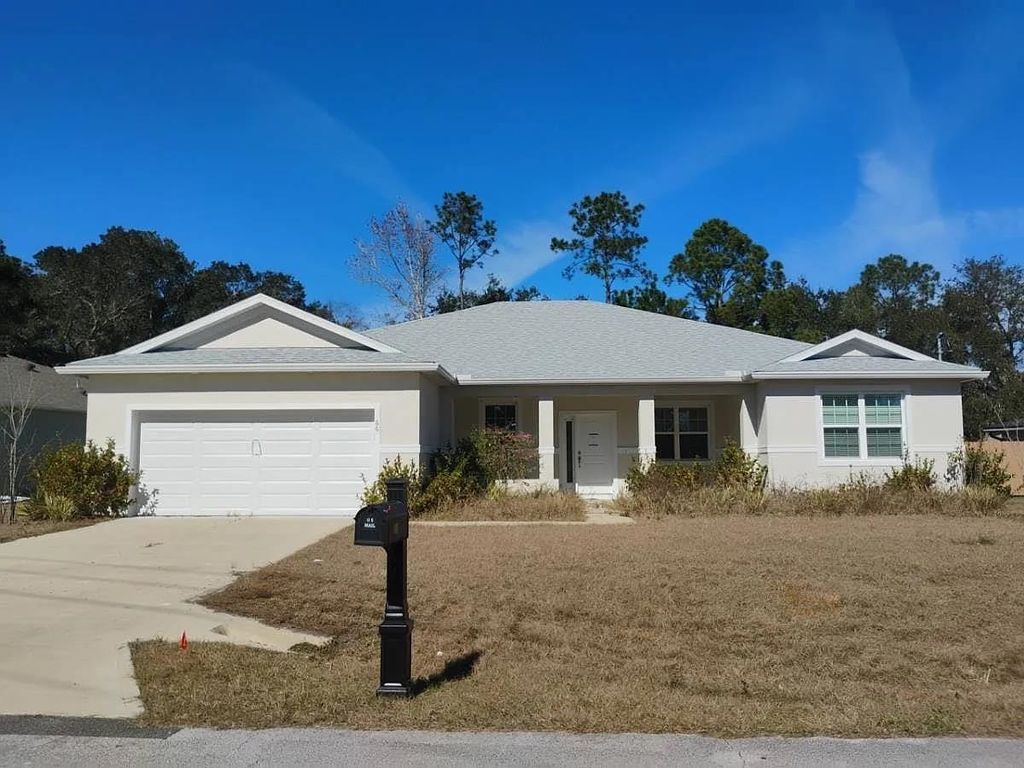 Photo of 66 Westhampton Drive, Other Florida, FL 32164 (MLS # 396323)