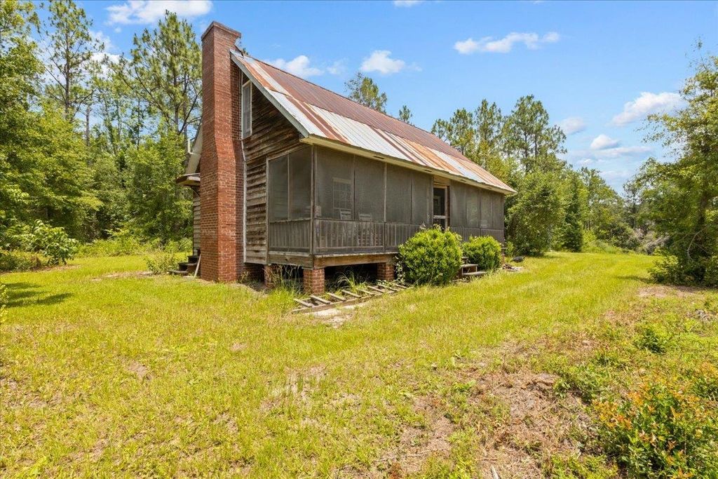 Photo of 837 NE Raspberry Way, Pinetta, FL 32350 (MLS # 388183)