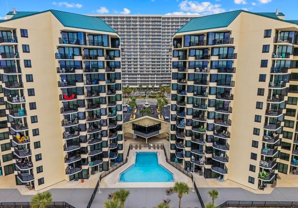 Photo of 9850 Thomas Drive #909E, Panama City, FL 32408 (MLS # 398765)