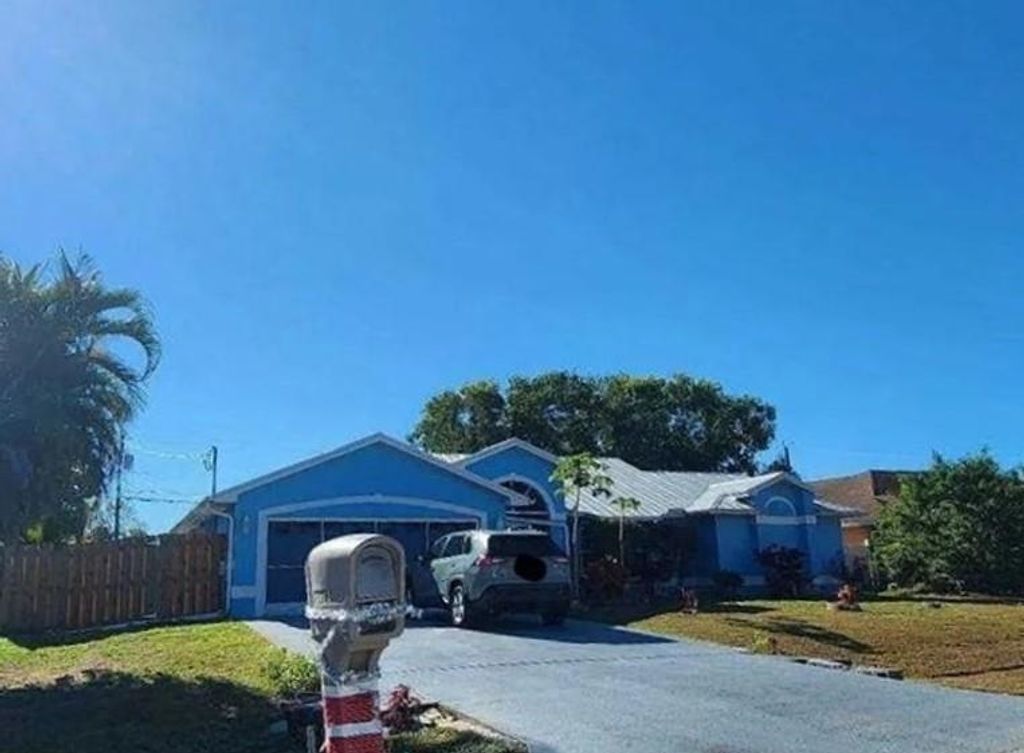 Photo of 5025 NW Egret Avenue, Other Florida, FL 34983 (MLS # 400152)