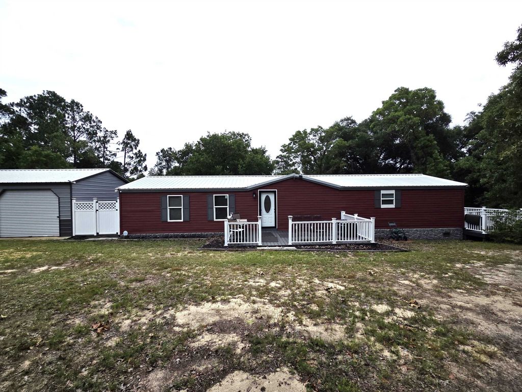 Photo of 19460 NW CR 67, Bristol, FL 32321 (MLS # 401822)