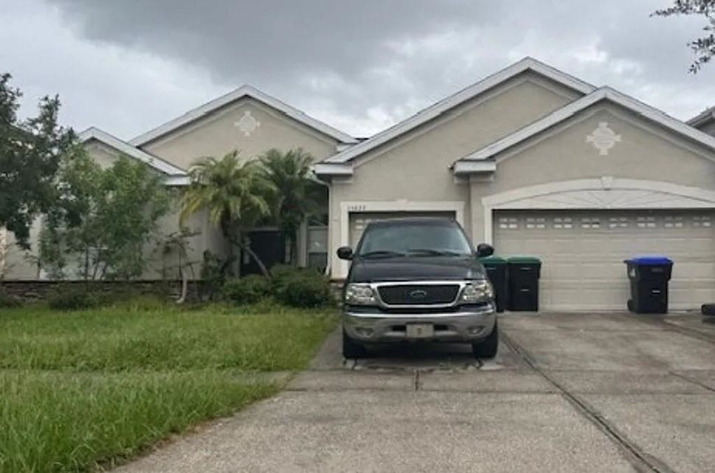 Photo of 14639 Grand Cove Drive, Other Florida, FL 32837 (MLS # 395171)