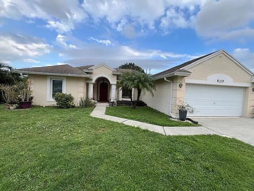 Photo of 1949 SW Aguero Street, Other Florida, FL 34953 (MLS # 397601)