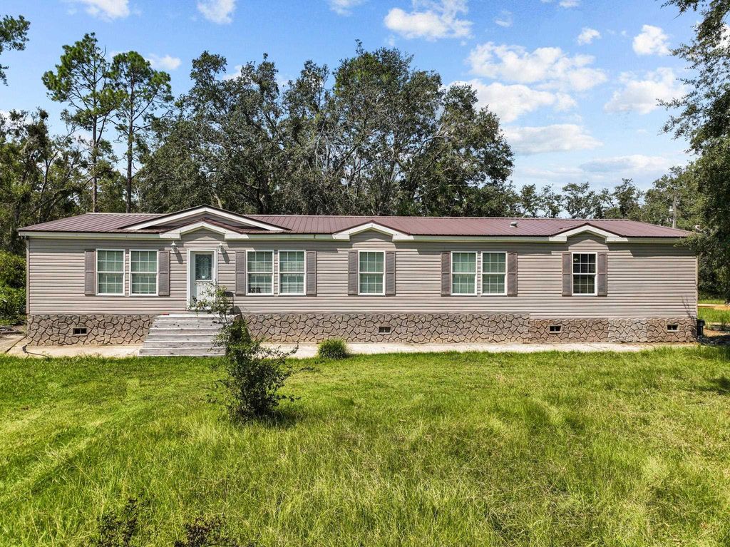 Photo of 6740 Austin McDonald Road, Perry, FL 32348 (MLS # 395095)