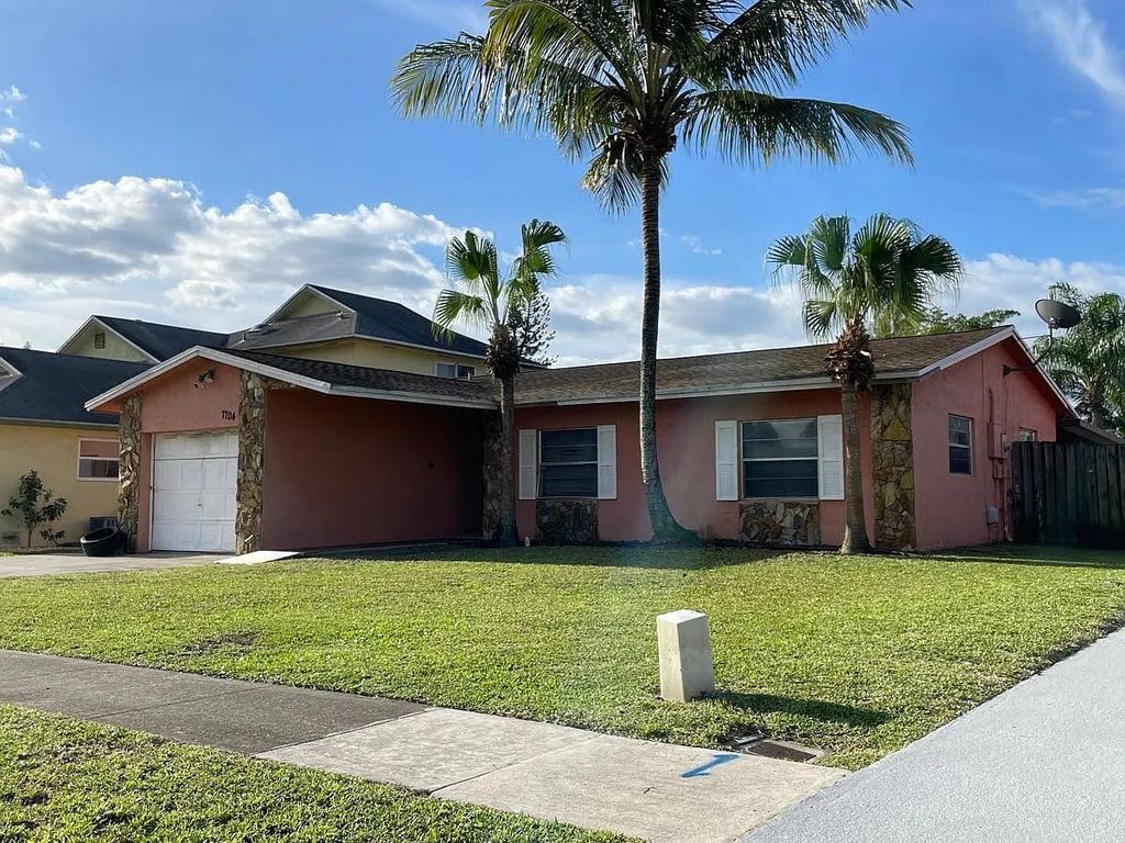 Photo of 7704 SW 8th Court, Other Florida, FL 33068 (MLS # 397066)