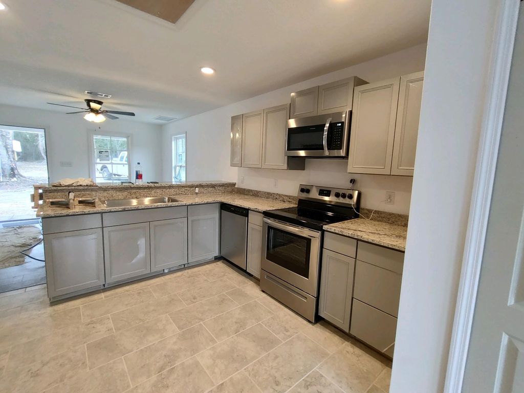 Photo of 321 NE Cedar Trail, Madison, FL 32350 (MLS # 392453)