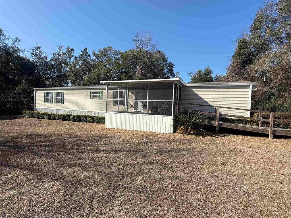 Photo of 107 NELSON Road, Crawfordville, FL 32327 (MLS # 395984)