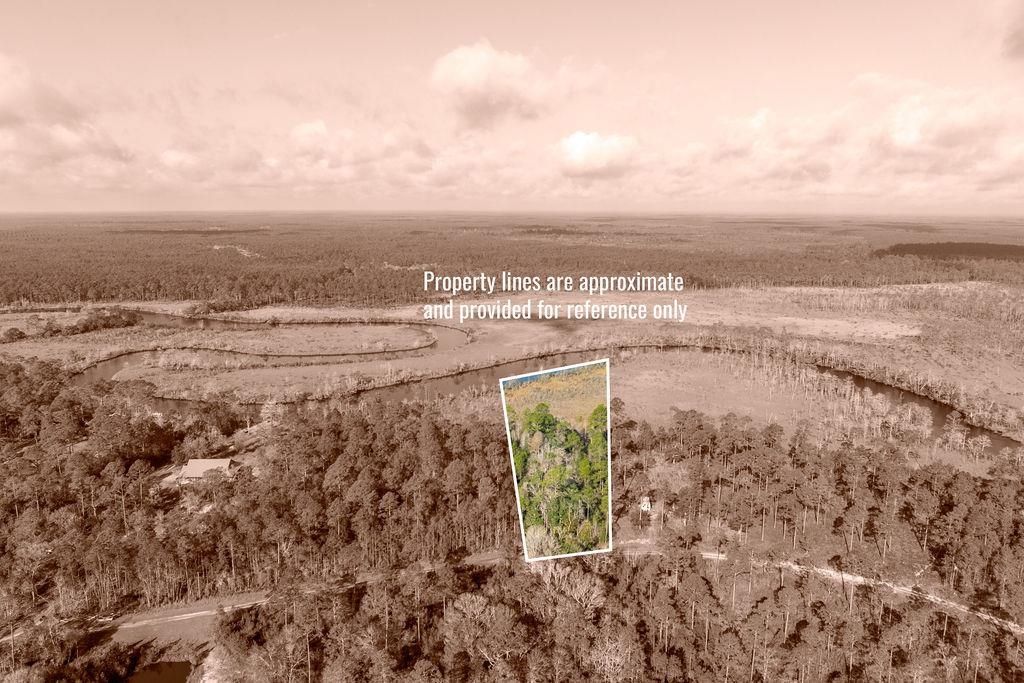 Photo of TBD River Bend Plantation #12, Carrabelle, FL 32323 (MLS # 397474)