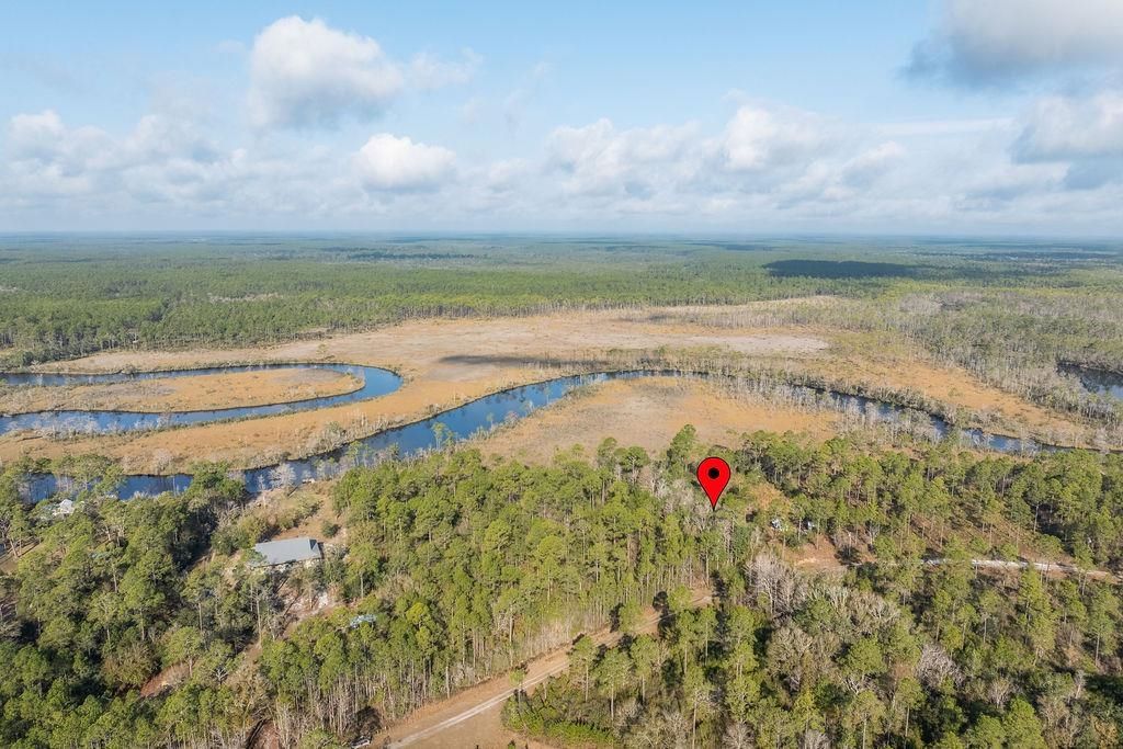 Photo of TBD River Bend Plantation #12, Carrabelle, FL 32323 (MLS # 397474)