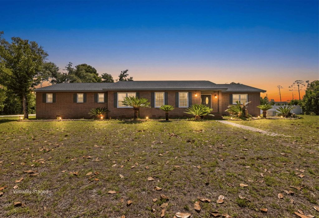 Photo of 404 Glenridge Road, Perry, FL 32348 (MLS # 399926)