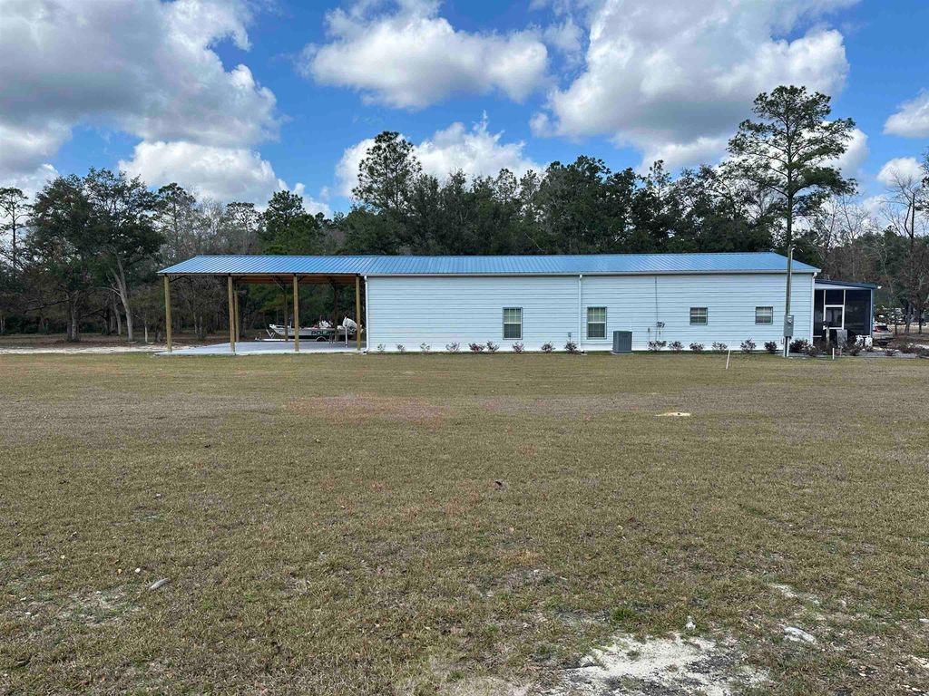 Photo of 605 Floyd Gray Road, Crawfordville, FL 32327 (MLS # 396734)