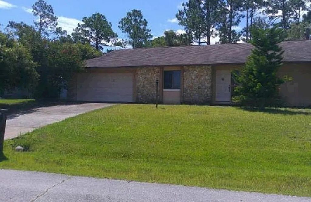 Photo of 3 Woodfalon Place, Other Florida, FL 32164 (MLS # 396322)