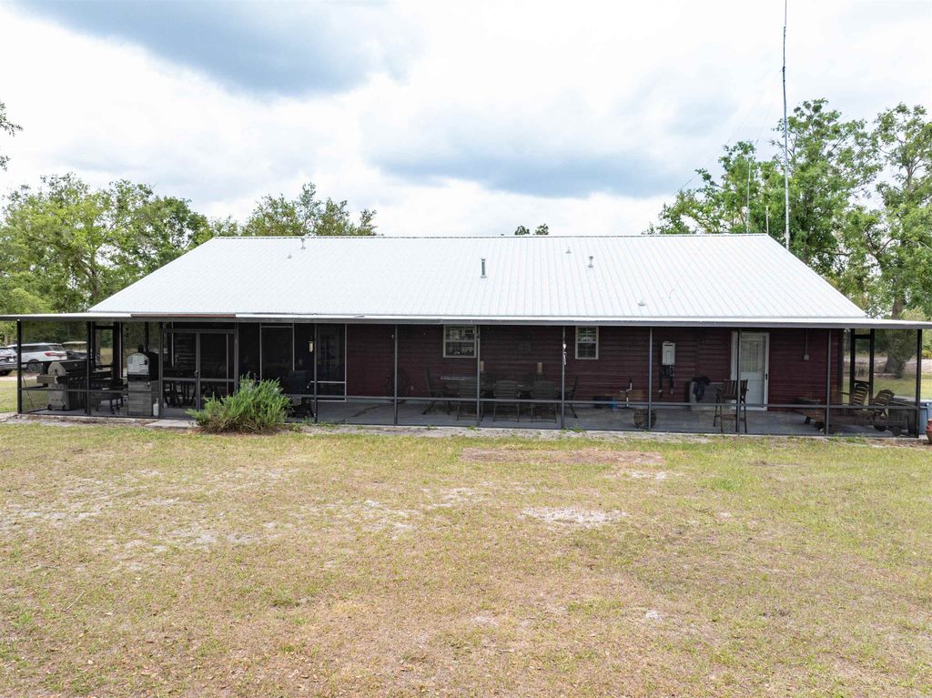 Photo of 6676 SE CR 255, Lee, FL 32059 (MLS # 392566)