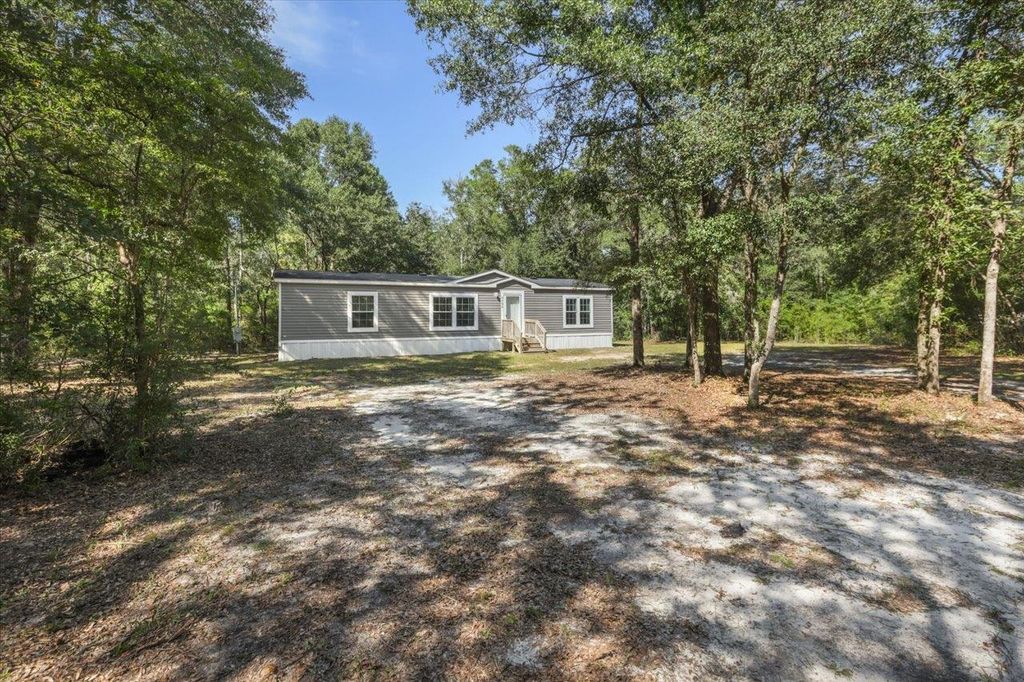 Photo of 1040 Hassell Drive, Tallahassee, FL 32305 (MLS # 390508)
