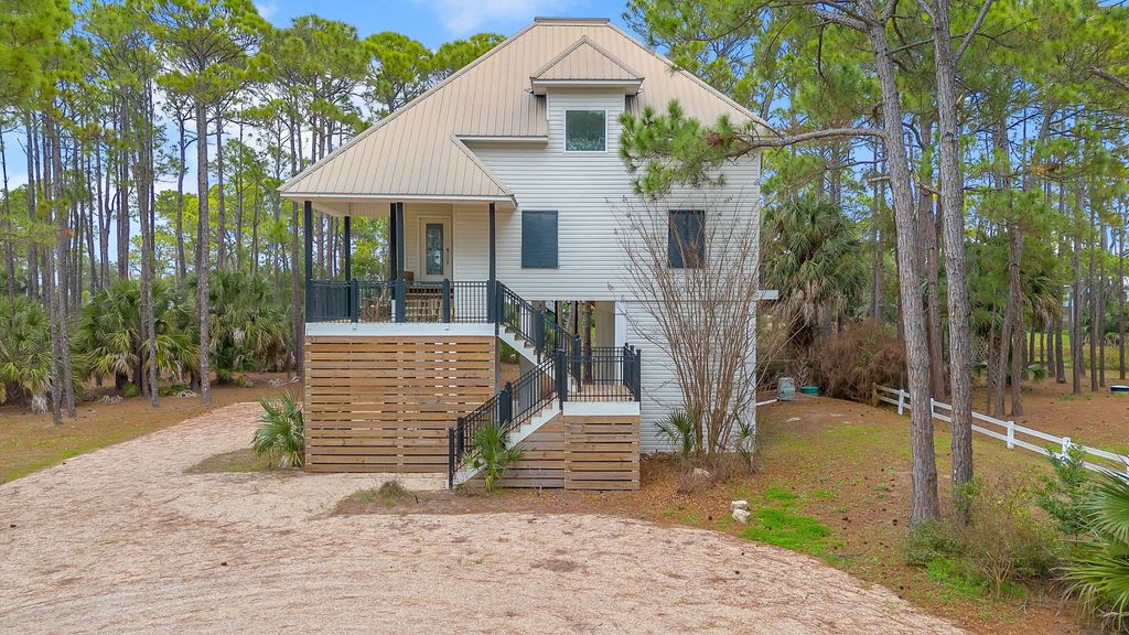Photo of 27 Harry Morrison Road, Alligator Point, FL 32346 (MLS # 395787)
