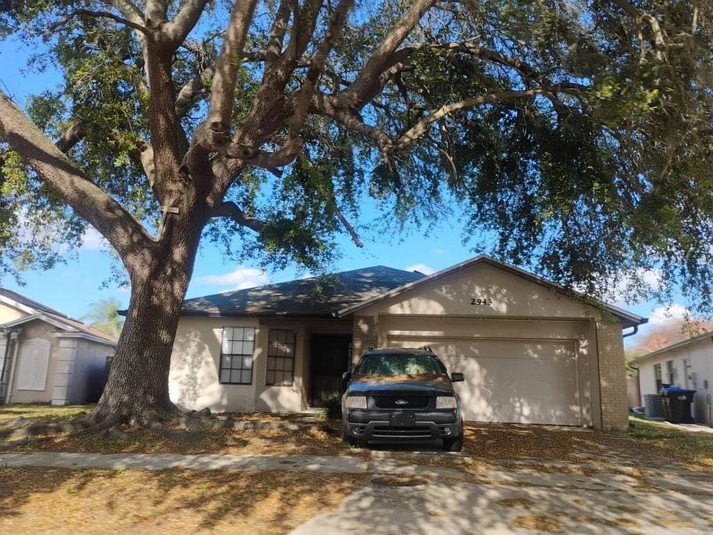 Photo of 2943 Woolridge Drive, Other Florida, FL 32837 (MLS # 398786)