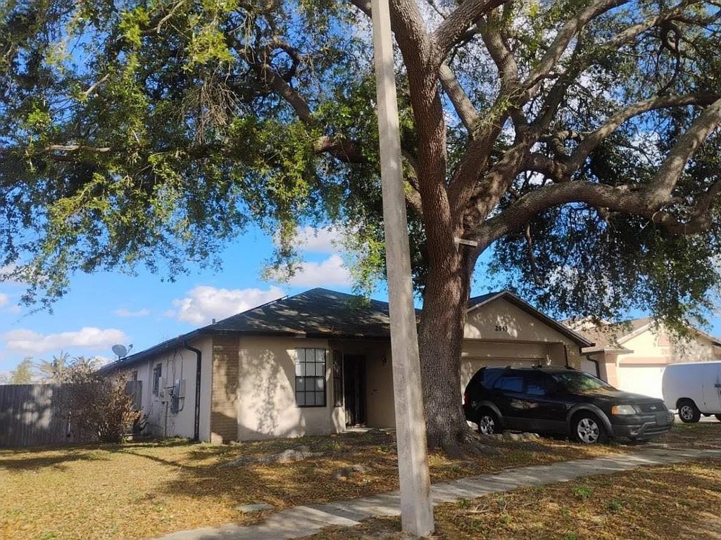 Photo of 2943 Woolridge Drive, Other Florida, FL 32837 (MLS # 398786)