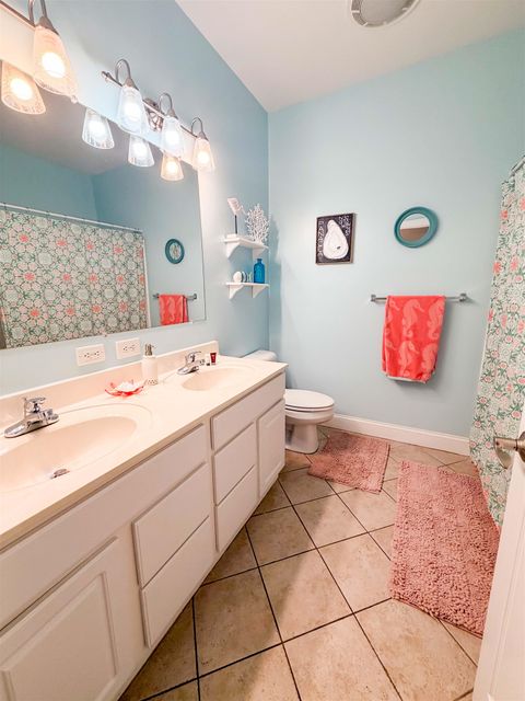 Tiny photo for 709 SE 3rd Street #D, Carrabelle, FL 32322 (MLS # 396866)