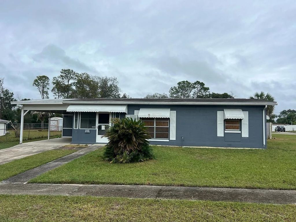 Photo of 802 Crawford Street, Other Florida, FL 32725 (MLS # 394478)