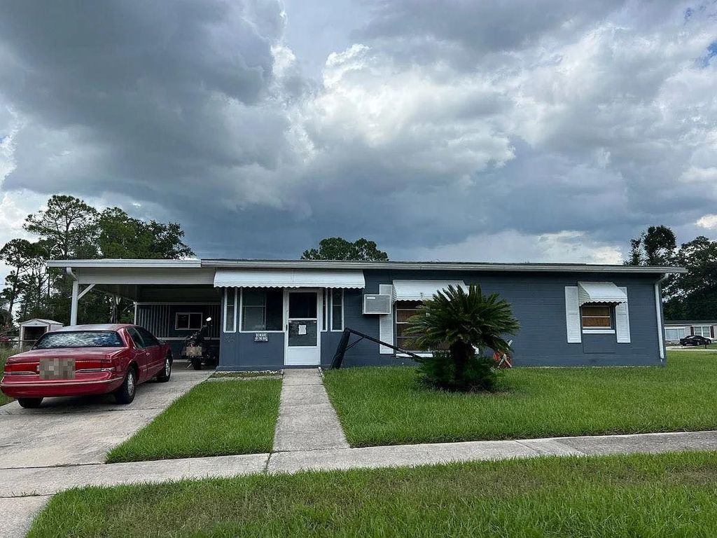 Photo of 802 Crawford Street, Other Florida, FL 32725 (MLS # 394478)