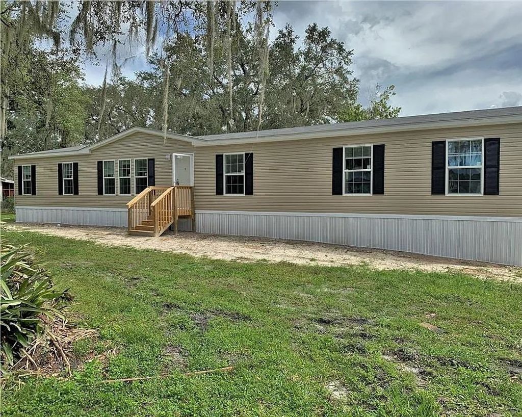 Photo of 6102 Woodhaven Drive, Other Florida, FL 33811 (MLS # 394156)
