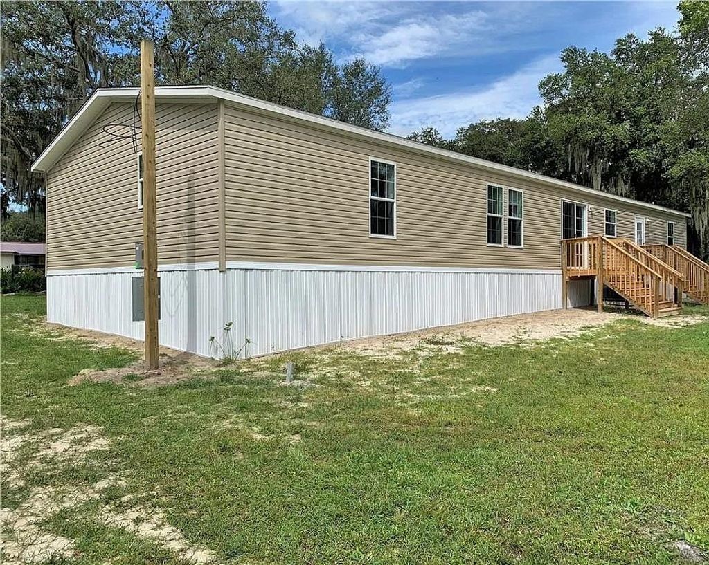 Photo of 6102 Woodhaven Drive, Other Florida, FL 33811 (MLS # 394156)