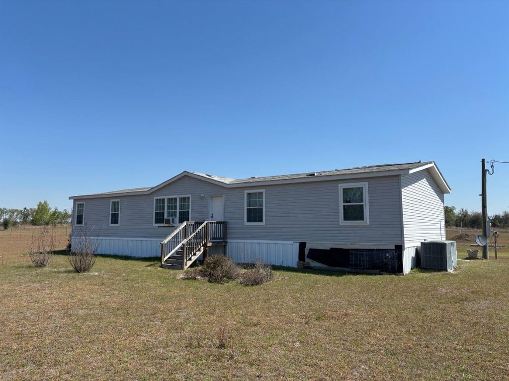 Photo of 2009 NE Rutherford Road, Lee, FL 32059 (MLS # 398022)