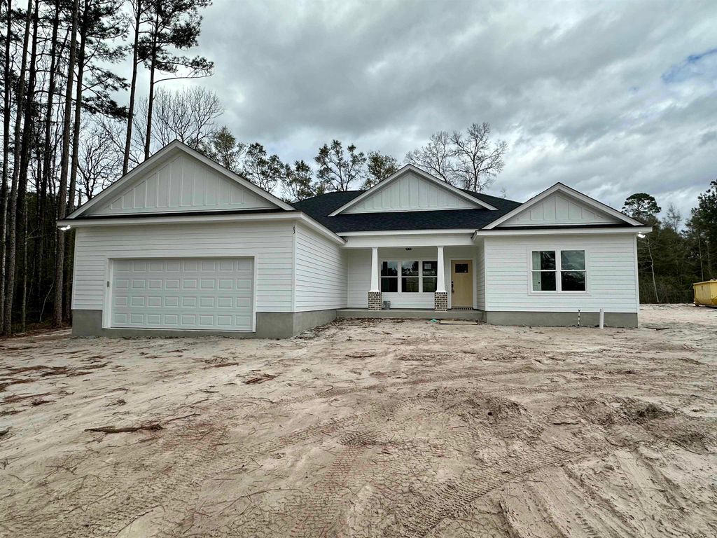 Photo of 63 Magpie Trail, Crawfordville, FL 32327 (MLS # 396570)