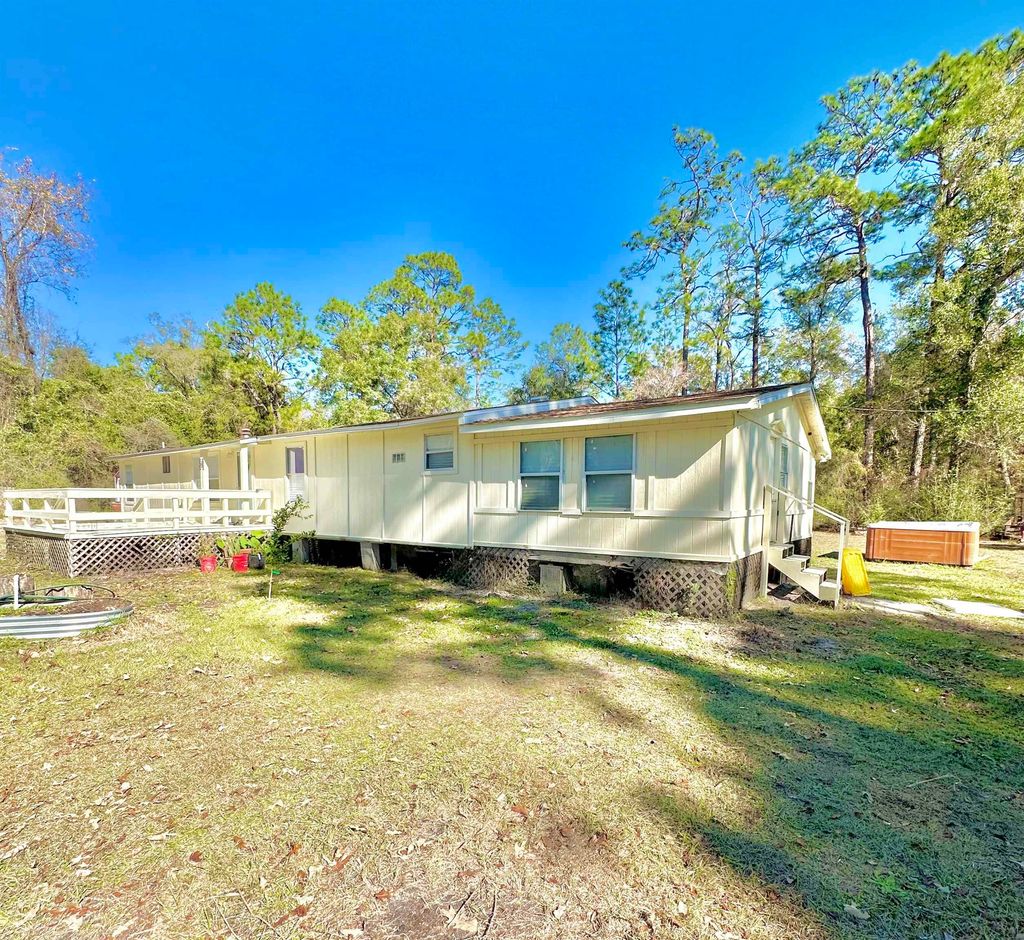Photo of 221 Woodville Highway, Crawfordville, FL 32327 (MLS # 394825)