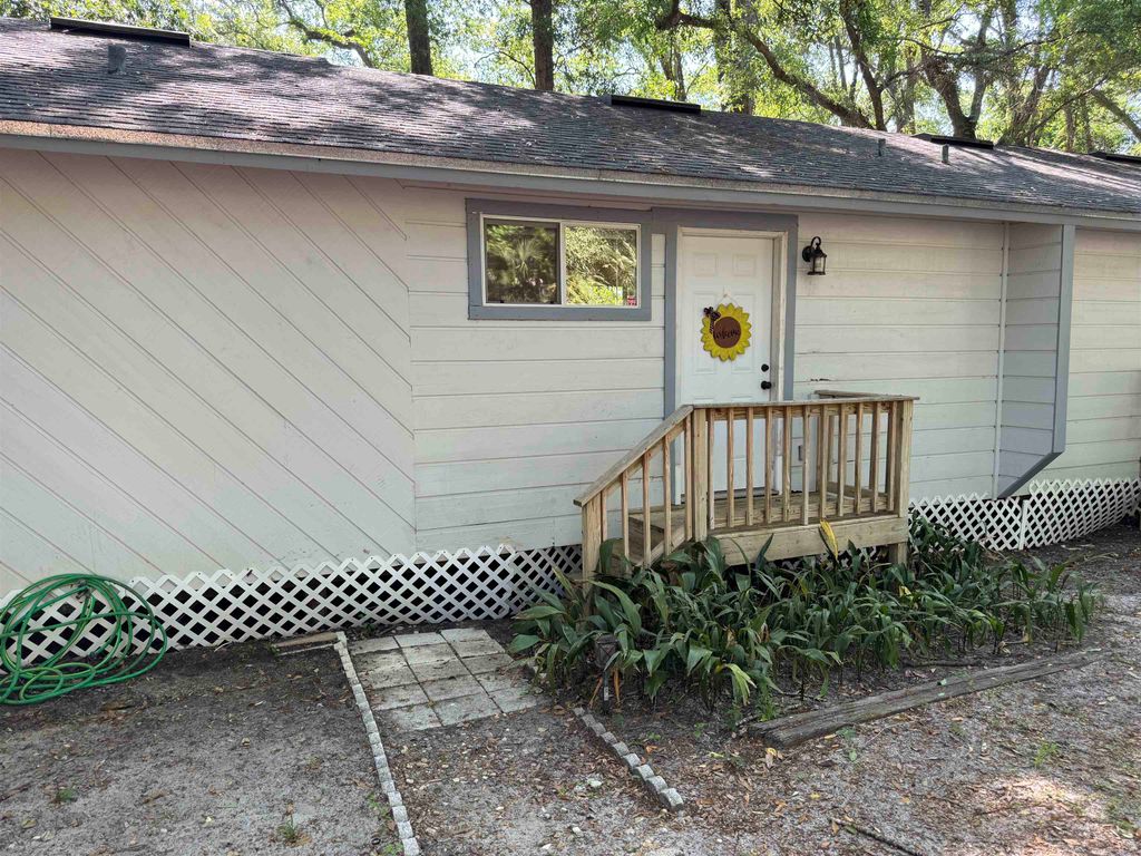 Photo of 3603-05 Shoreline Drive #5, Tallahassee, FL 32305 (MLS # 392181)