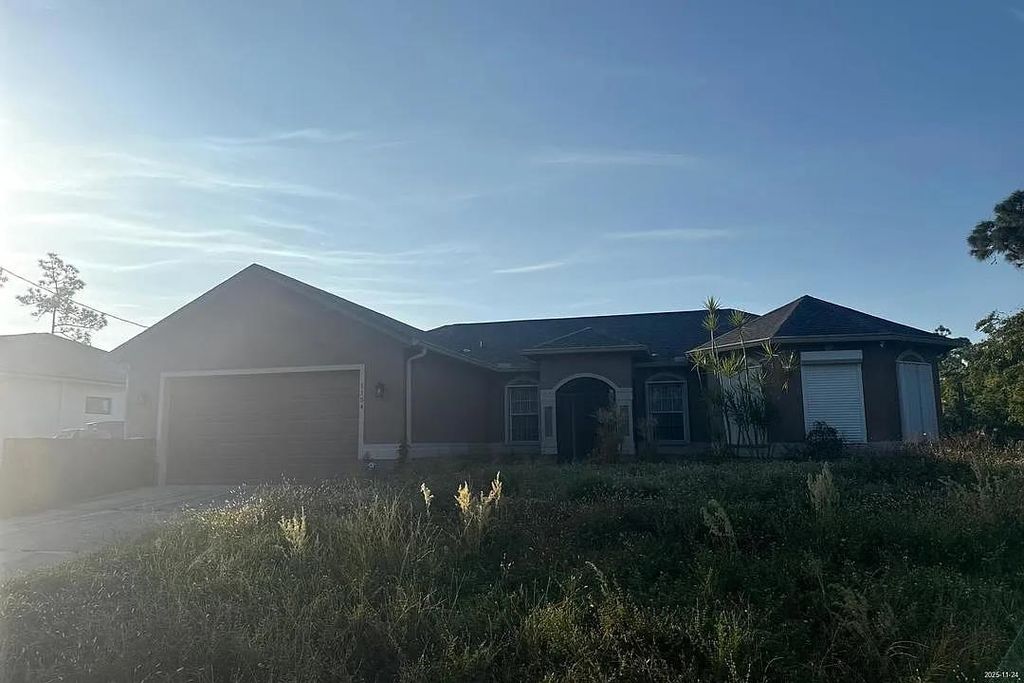 Photo of 1154 Damen St E St, Other Florida, FL 33974 (MLS # 394020)