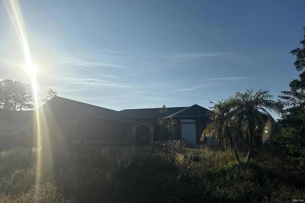 Photo of 1154 Damen St E St, Other Florida, FL 33974 (MLS # 394020)