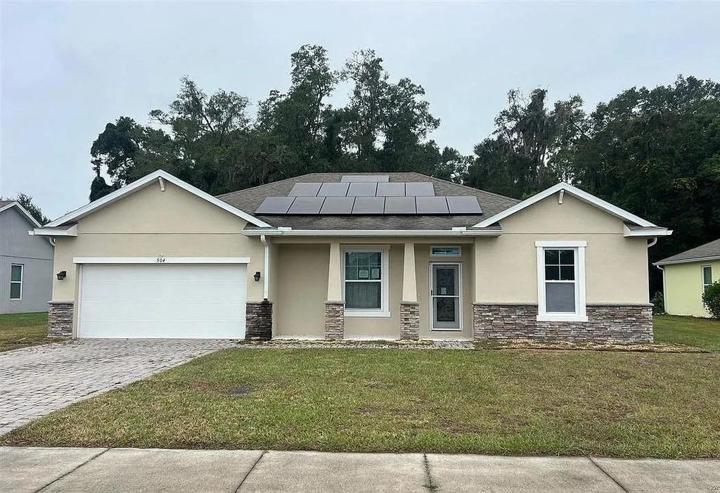 Photo of 504 Bird Song Court, Other Florida, FL 32720 (MLS # 402692)