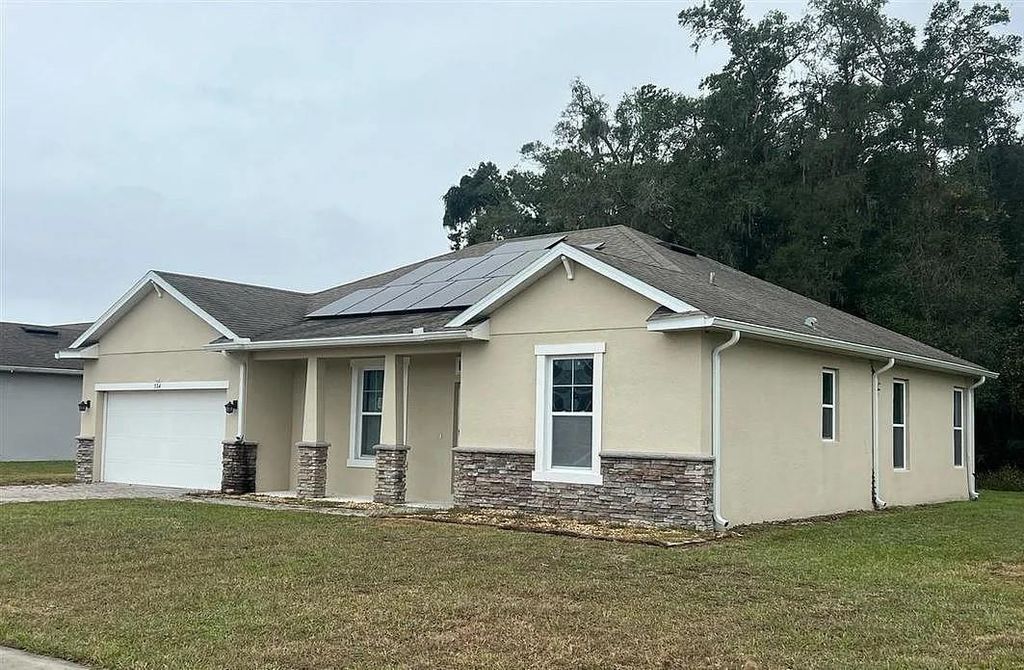 Photo of 504 Bird Song Court, Other Florida, FL 32720 (MLS # 402692)