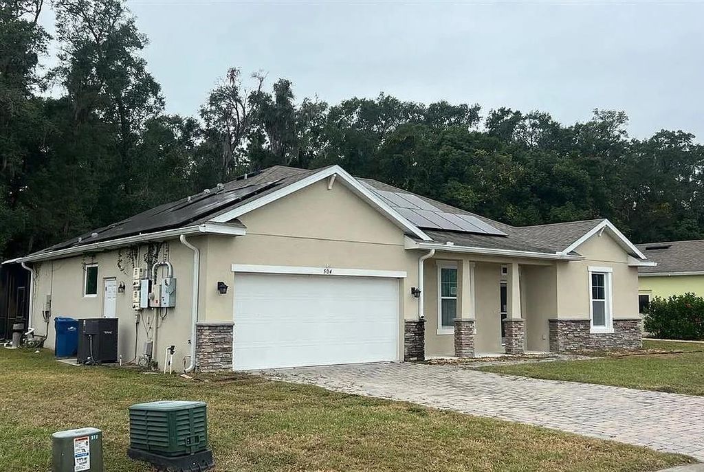 Photo of 504 Bird Song Court, Other Florida, FL 32720 (MLS # 402692)